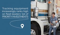 Truck driver beside tractor trailer